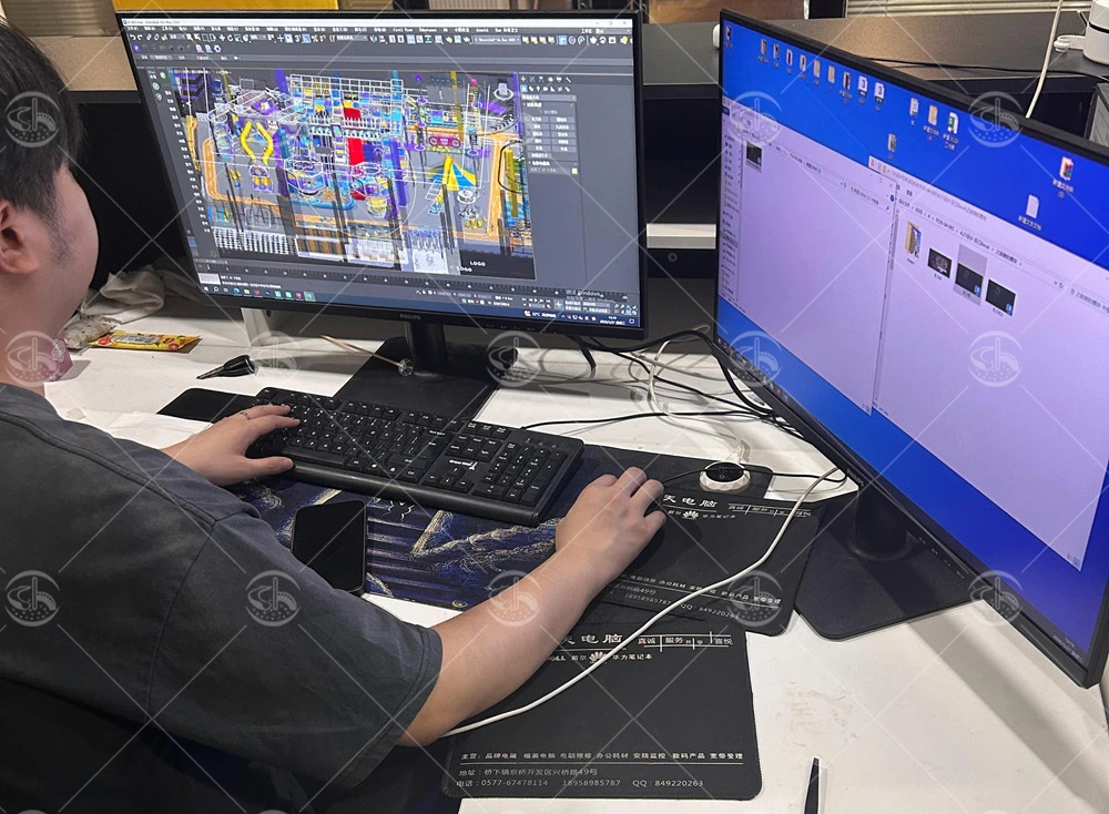 Design engineer working on 3D renderings and space planning for a custom indoor playground project.