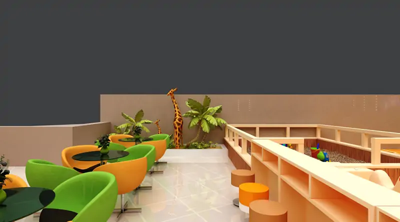 Parent resting lounge with green sofas in indoor children play center